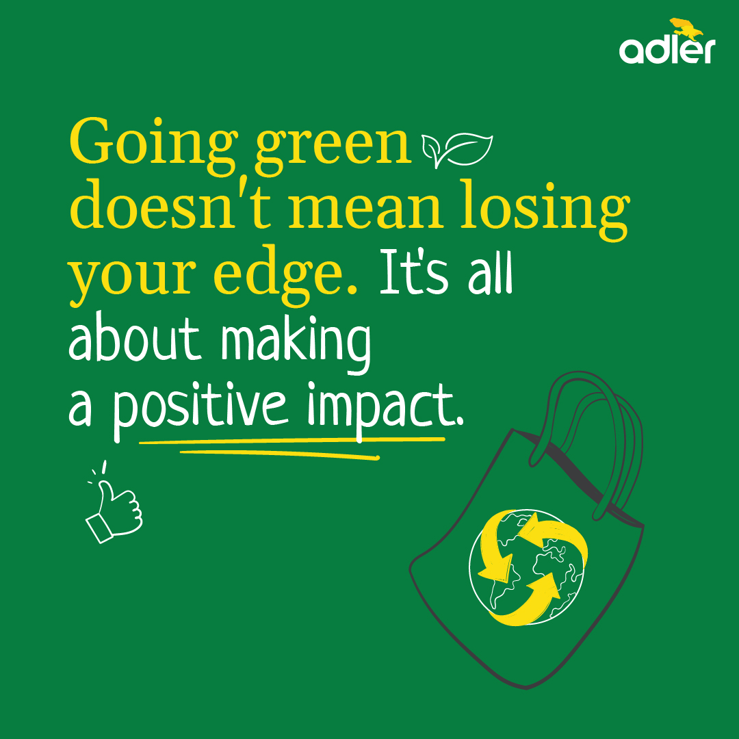 A tote bag with a recycling symbol on a green background with a message